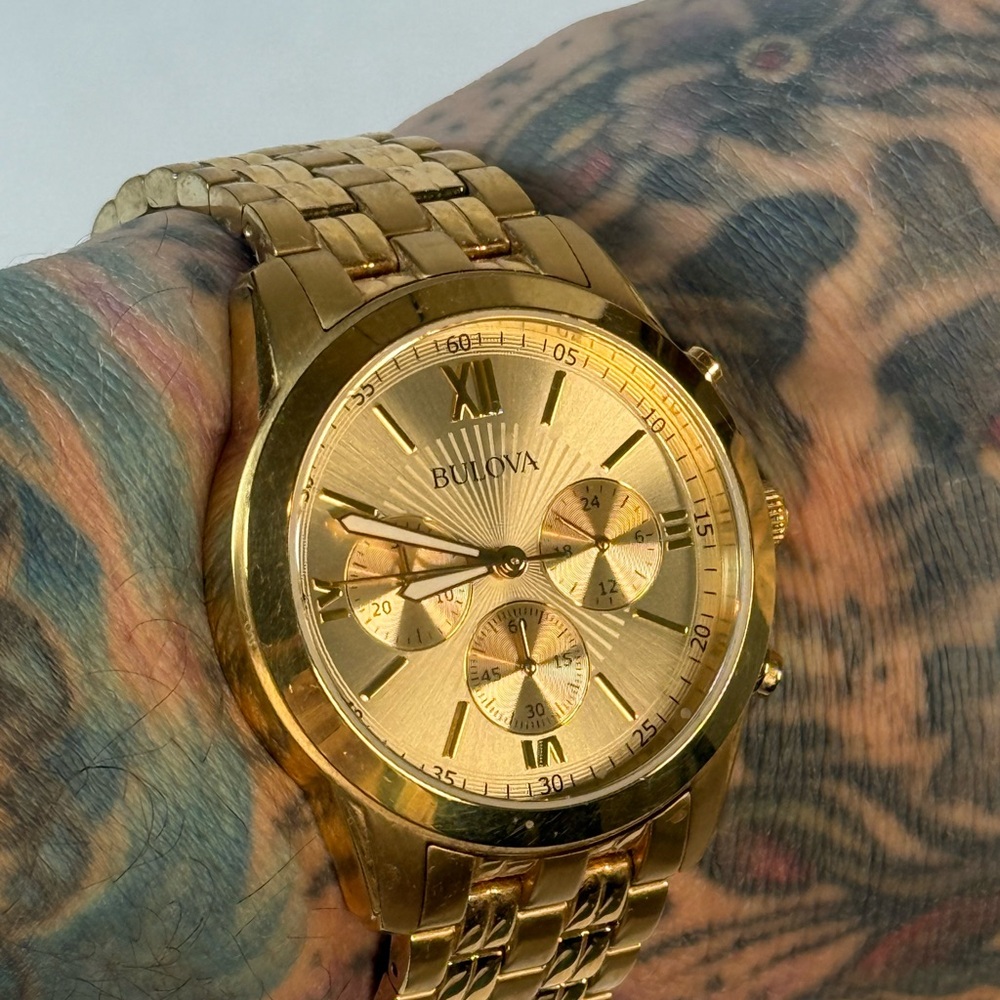 Gold tone bulova watch in good used condition